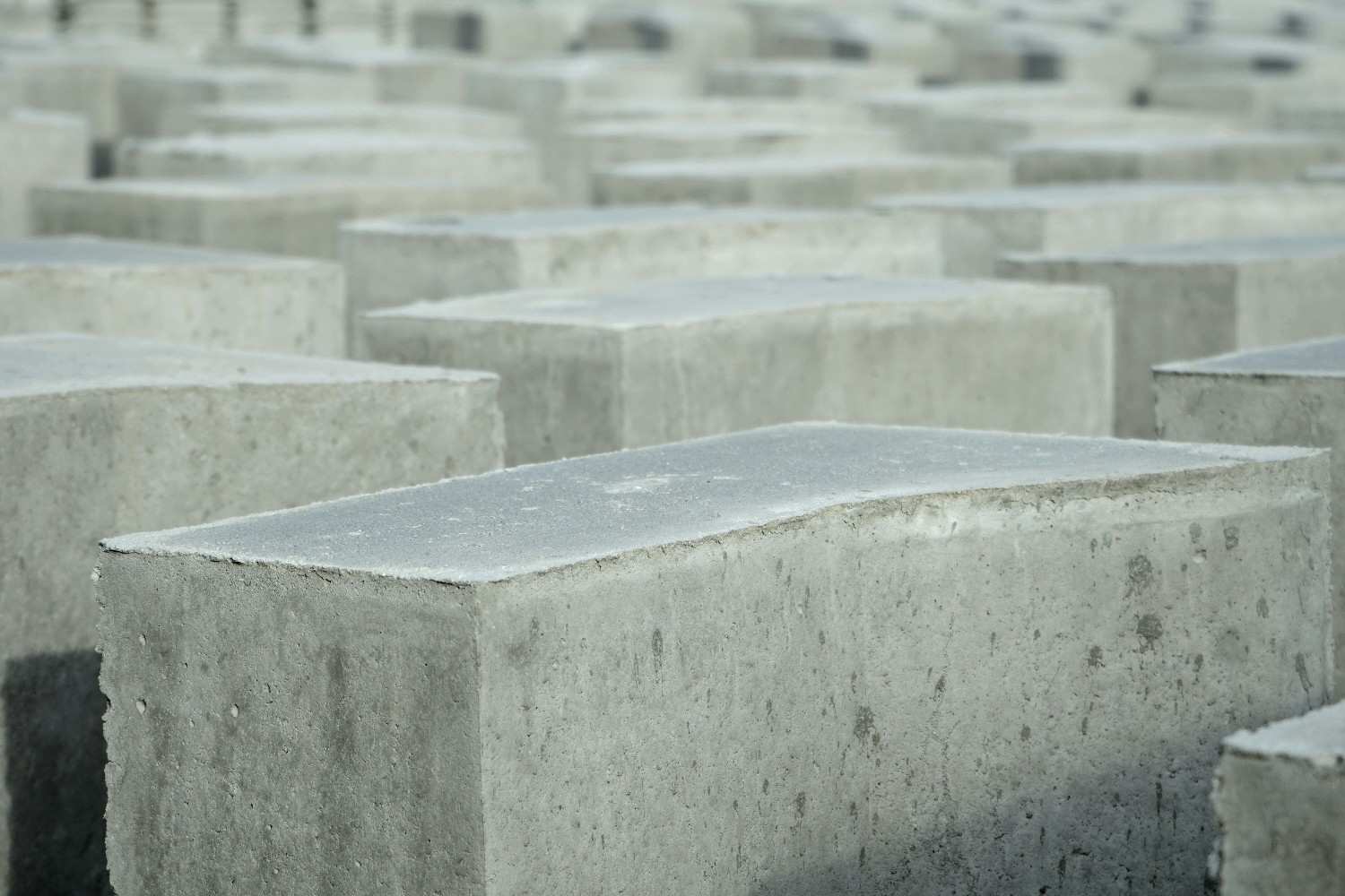 Close-up view of sustainable concrete blocks used as eco-friendly building materials in green construction projects.