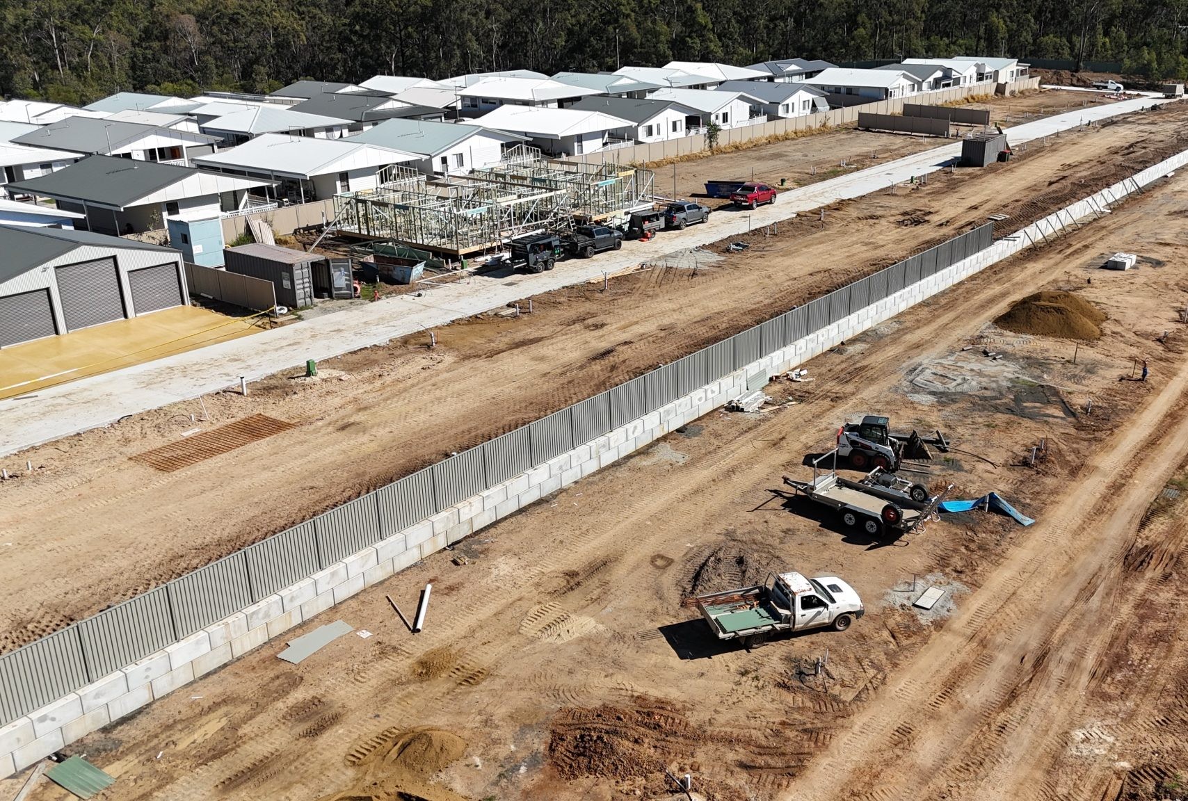 Precast concrete blocks in Australia used to construct a retaining wall at a residential development site