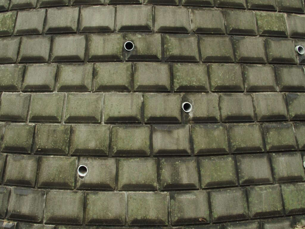 coastal retaining wall drainage setup, managing water flow.