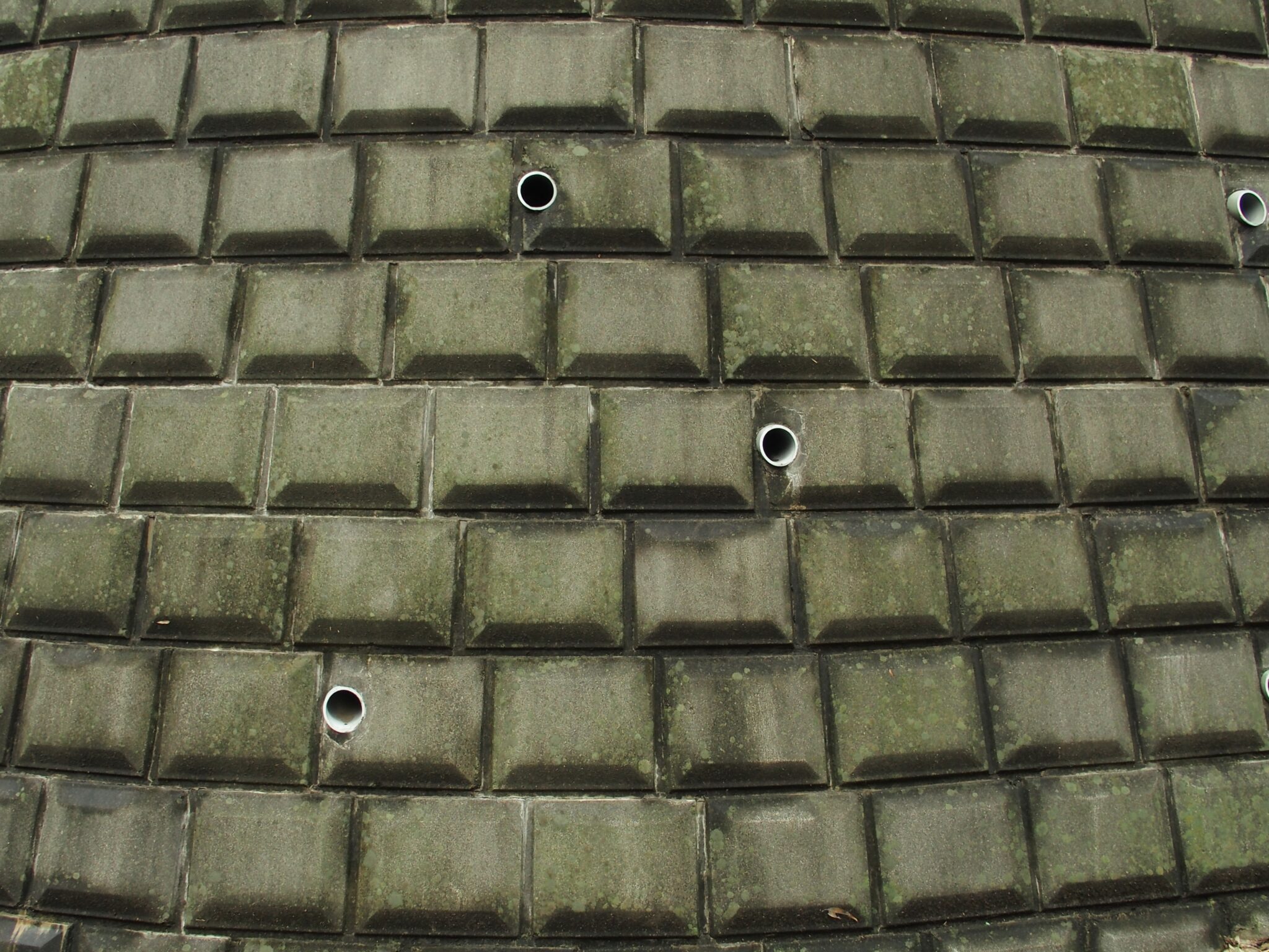 coastal retaining wall drainage setup, managing water flow.
