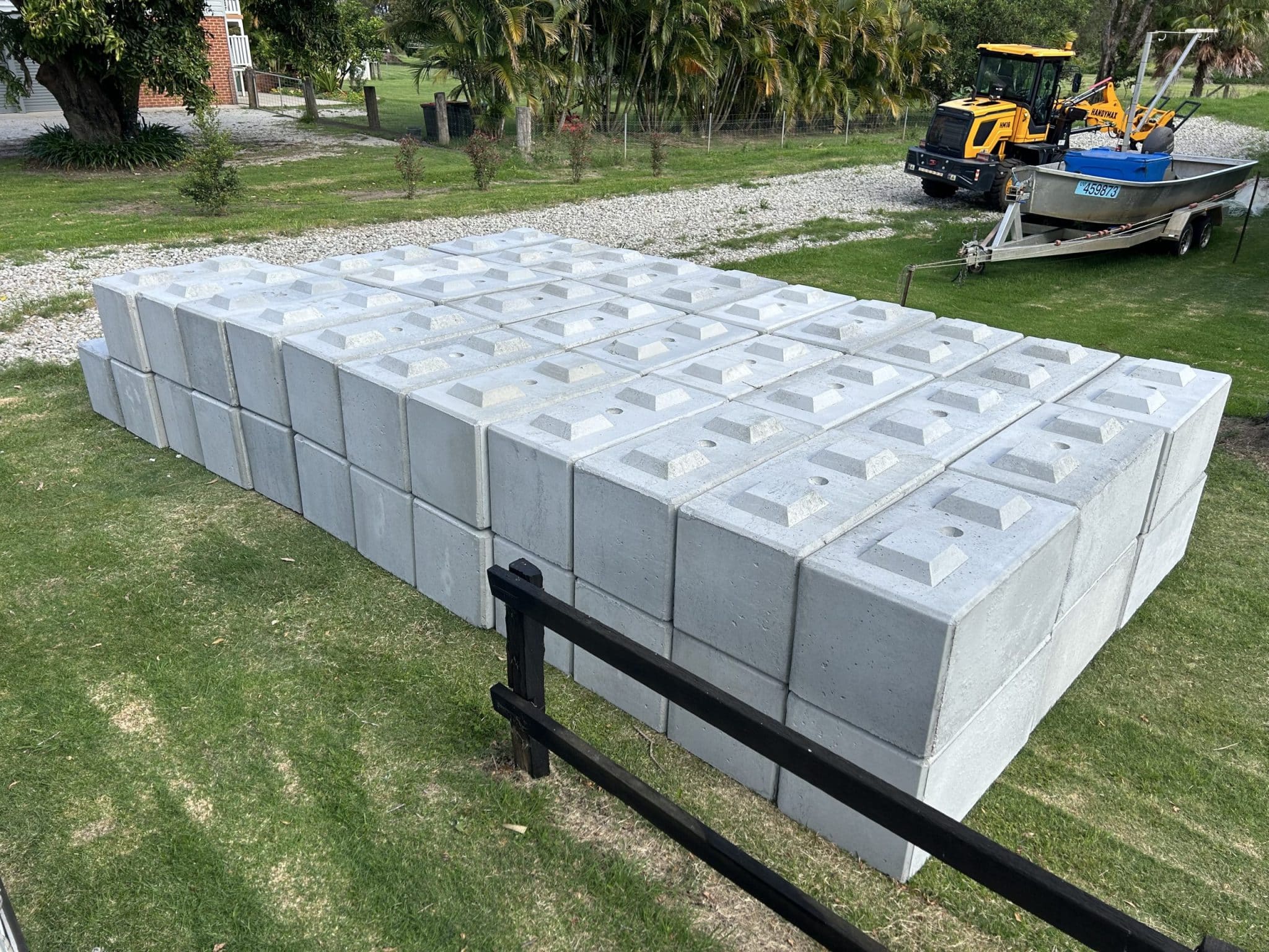 Stacked precast concrete blocks on the Gold Coast, ready for sustainable construction and landscaping projects.