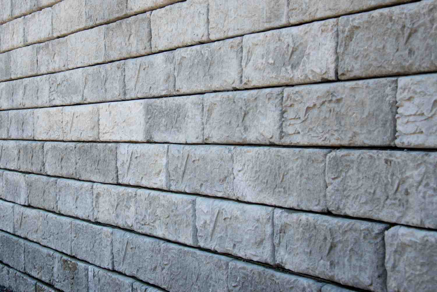 Stone block retaining wall designed to meet retaining wall council approval requirements on the Gold Coast