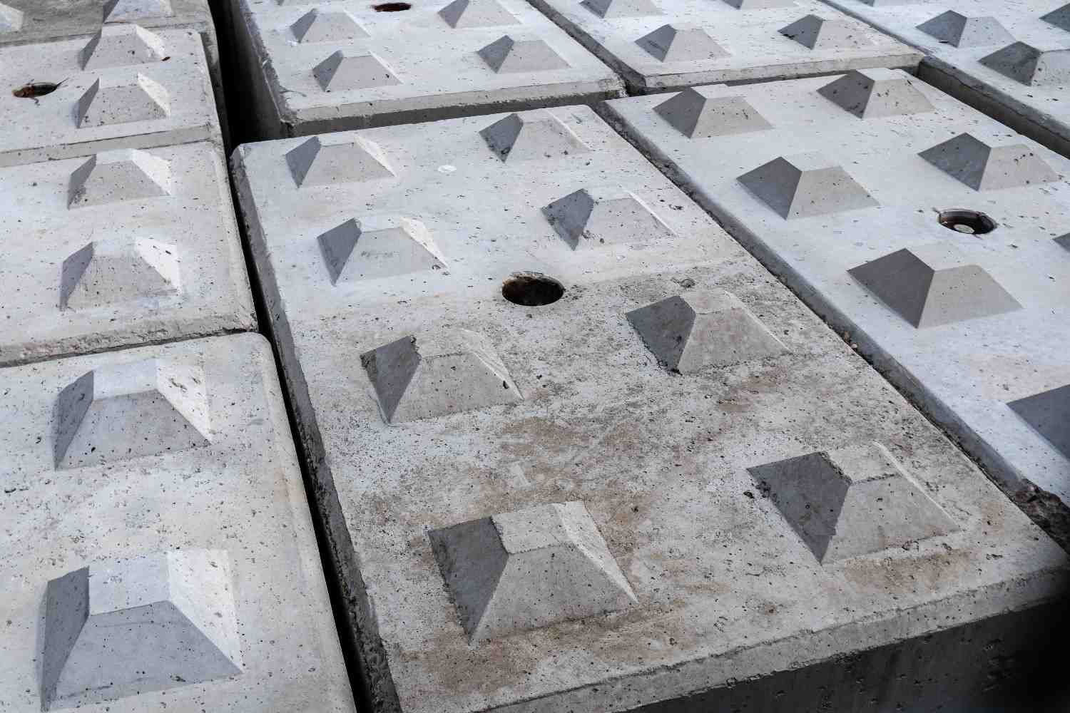 Recycled Concrete vs Virgin Concrete comparison showing precast concrete blocks with textured surface