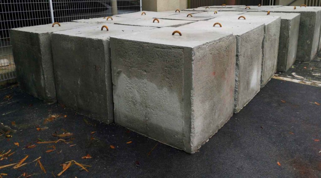 Modular precast concrete blocks stacked in a yard, ready for civil and commercial projects on the Gold Coast